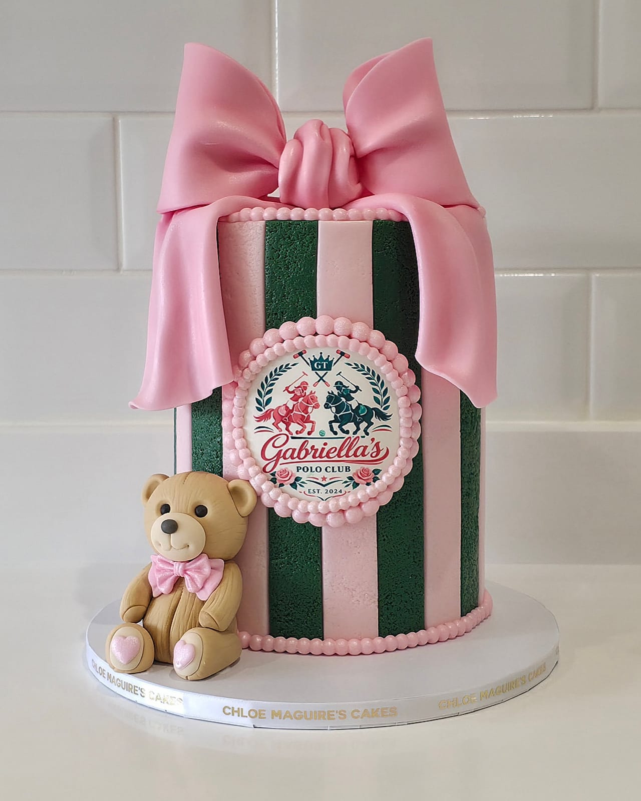 Green stripe cake with a sugar bow