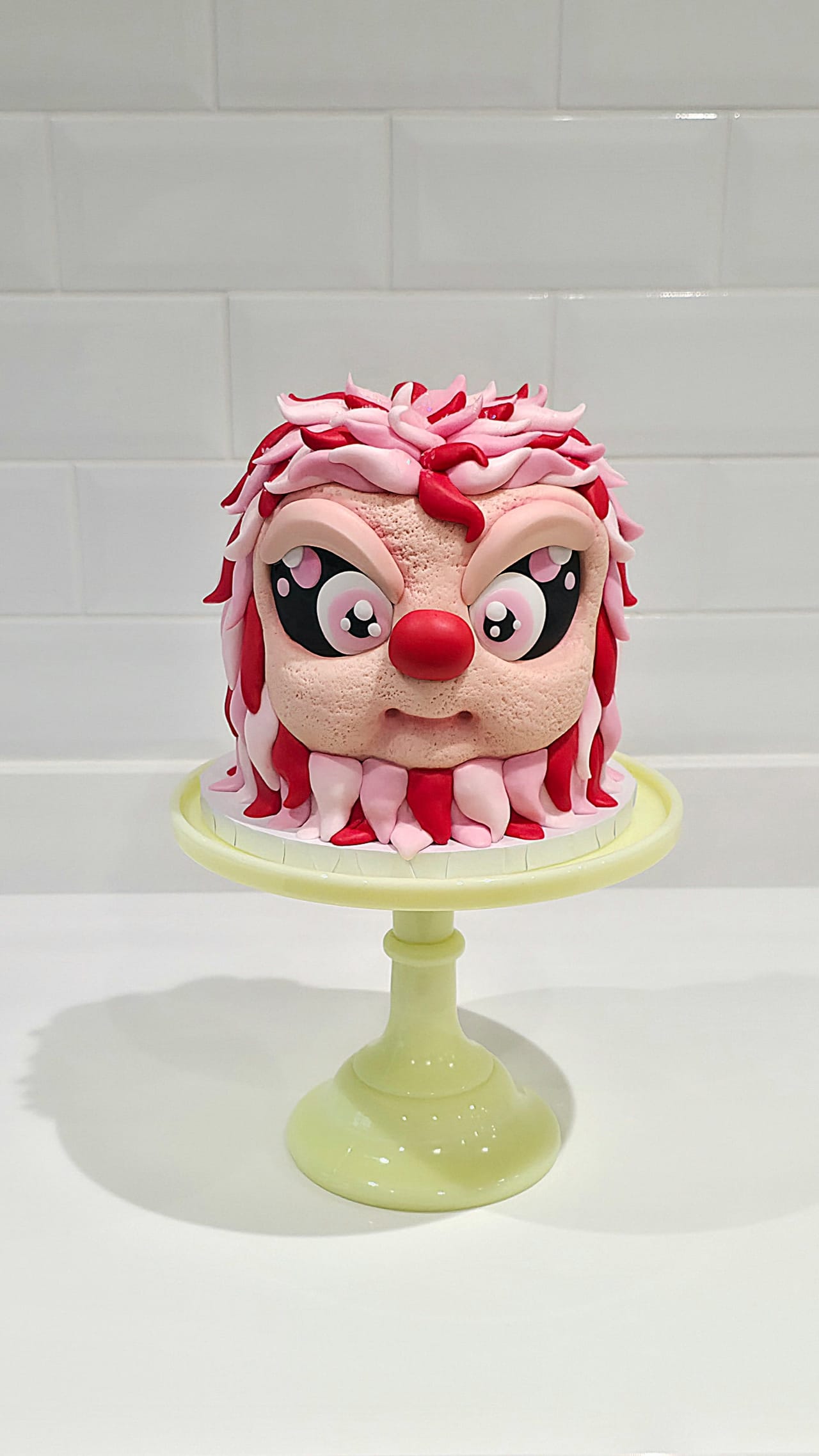 Pink hedgehog character cake